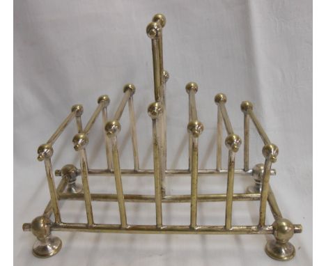 A silver plated toast rack after a Christopher Dresser design with stepped ball and stick dividers