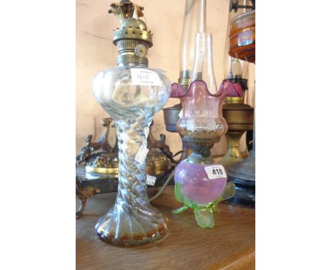 A Victorian cranberry and opaline North Country style glass oil lamp and similar shade - sold with a moulded glass example