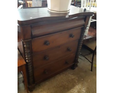 A 1.12m Victorian mahogany Scottish chest with serpentine top, blind frieze drawer, three long graduated drawers under and fl