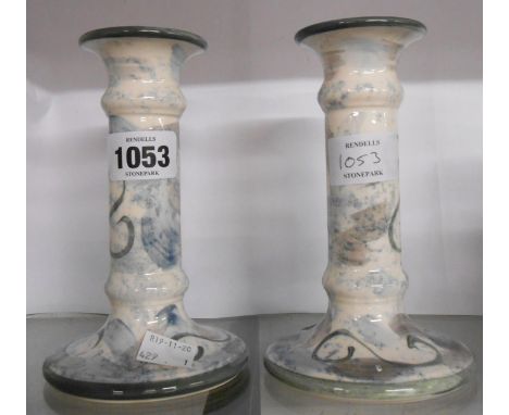 A pair of Poole Pottery Bellini candlesticks