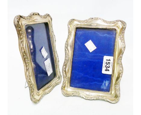 A pair of silver fronted photograph frames, one with worn easel back, the other missing - Birmingham 1907