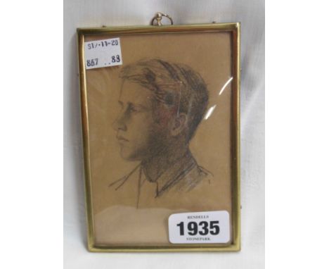 A small gilt framed pencil head and shoulders portrait of a young man
