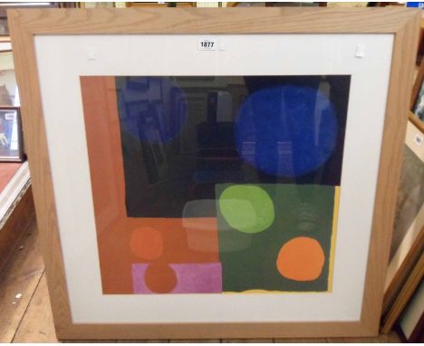 A large framed unsigned abstract form print with polychrome circular and block shapes