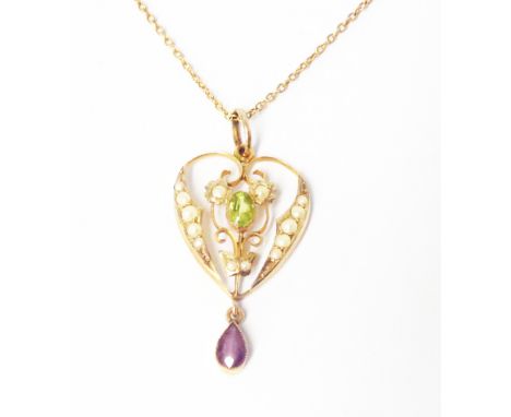 An Edwardian design 9ct. gold seed pearl, peridot and amethyst drop pendant, on 9ct chain - boxed