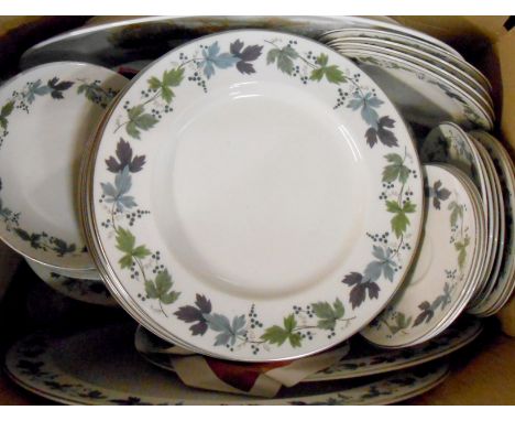 A Royal Doulton Burgundy pattern part tea and dinner service including bowls, cups and saucers, egg cups, etc.