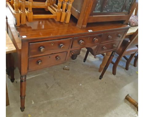 A 1.19m late Regency mahogany kneehole sideboard with low raised gallery to top, central frieze drawer and four flanking shor