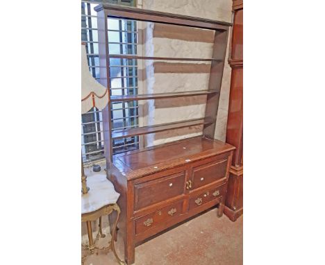 A 1.16m antique oak dresser base with pair of panelled cupboard doors and short drawers under, set on moulded legs - surmount