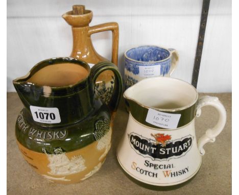 A Doulton Lambeth Dewar's Perth Whisky jug, a Mintons Brains Mount Stewart Whisky jug, a Kennedy of Glasgow stoneware flagon 