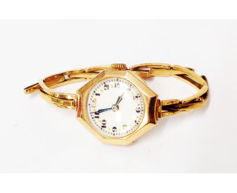 A vintage 9ct. gold cased lady's wristwatch, on marked 9ct expanding bracelet