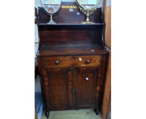 A 74cm Regency mahogany and brass inlaid chiffonier with decorative inlay to raised shelf back over a base with frieze drawer