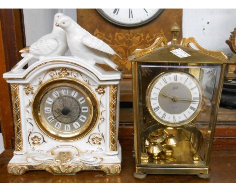 A Shatz lantern pattern anniversary clock - sold with a dove decorated porcelain battery timepiece