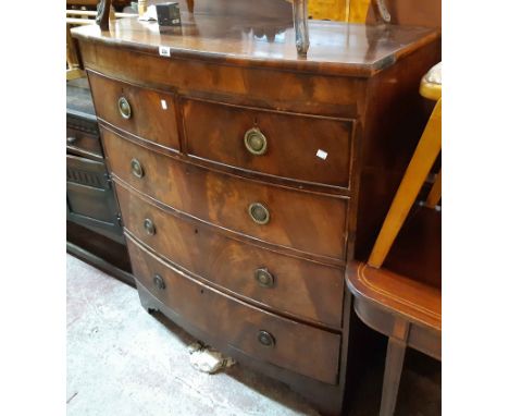 A 1.06m 19th Century mahogany bow front chest of two short and three long graduated drawers, set on bracket feet