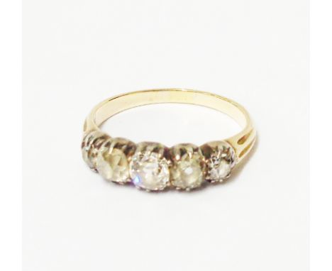 An antique high carat five stone old cut diamond ring