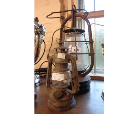 Two vintage hurricane lamps