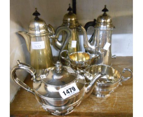 A silver plated three piece tea set with applied cast decoration - sold with two coffee pots (one a/f), a hot water jug and s