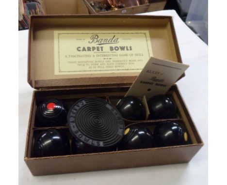 A vintage boxed set of Banda carpet bowls