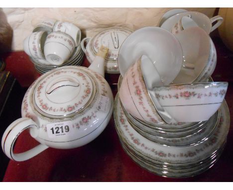 A vintage Japanese part tea and coffee service comprising six trios, sucrier, milk jug, and five coffee cups