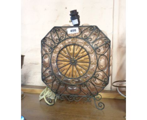A French bubble glass and wire cased lantern with internal electric timepiece