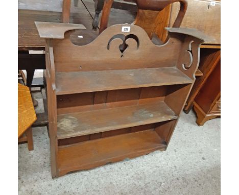 A 75cm late Victorian oak wall mounted three shelf unit with pierced decoration to top and sides