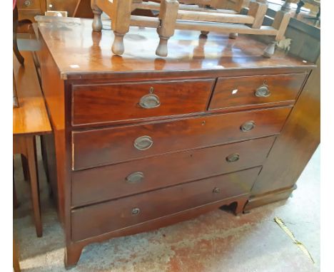 A 1.11m 19th Century mahogany chest with two short and three long graduated drawers, set on raised bracket feet - damaged edg