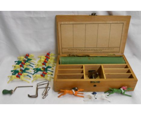 A vintage Chad Valley Escalado game in wooden box with three original horses, betting card, and assorted additional horses