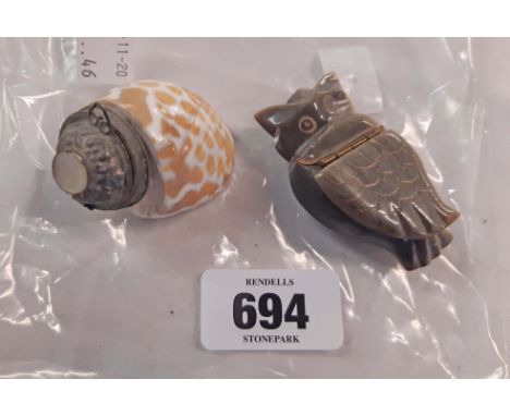 A snuff box made from a small seashell - sold with a horn similar of owl form