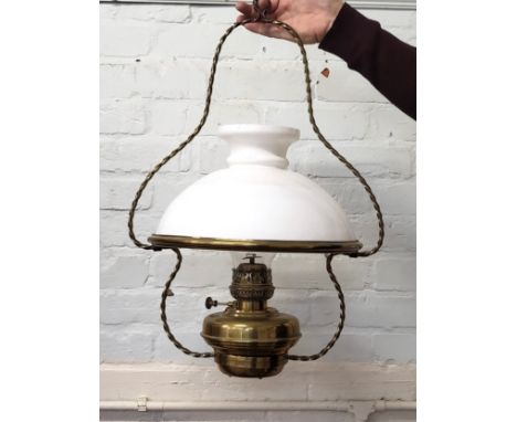 A hanging oil lamp 64cm x 44cm x 44cm.