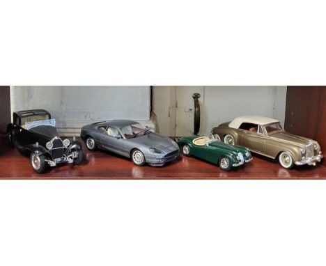 Four large scale diecast cars including Solido Bugatti Royal 1930 and Bentley SII 1961, Burago Jaguar XK120 and metallic grey