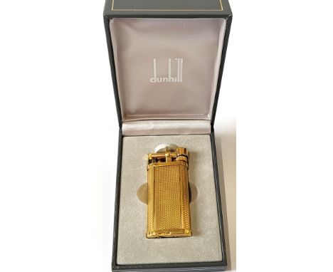 A Dunhill "Barley Gold Unique" Lighter, serial number 346324. Boxed and presented in as new condition.