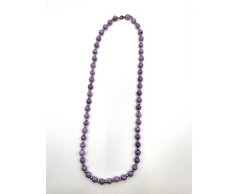 A choker length purple jade (tested Presidium) necklace interspaced with silver coloured cultured pearls and a silver jump ri