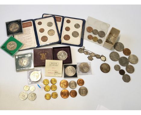 A collection of coins including two Britain's First Decimal coins in wallets, crowns including two Winston Churchills, Queen 