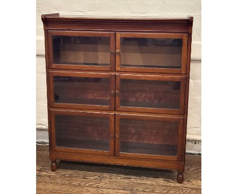 An antique mahogany, Globe Wernicke style stacking bookcase/ display cabinet in three sections with two doors per section. On