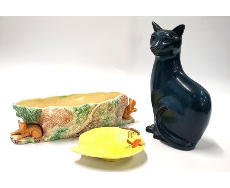 A Sylva 2598 Squirrel trough 35cm wide, Royal Venton Ware yellow leaf dish 18cm, and a Poole cat 29cm. (3)