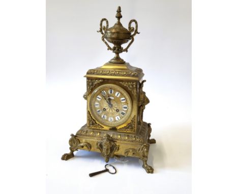 An Antique brass striking mantle clock by Comptoir General, Paris. H.Riodet with key. c1880. 42cm.
