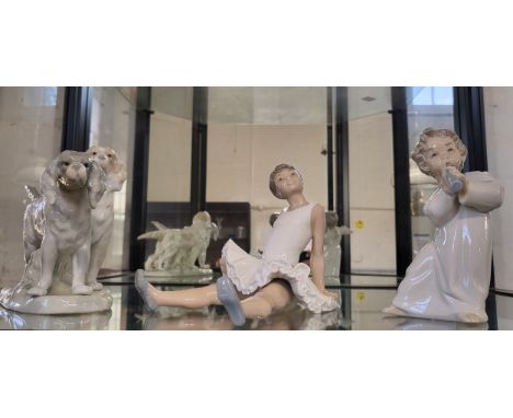 Lladro angel 16cm, Nao seated ballet dancer 15cm, and Rex puppies 22cm long.
