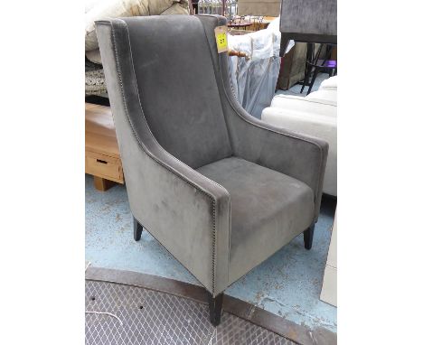 SOFA &amp; CHAIR COMPANY CHRISTO WINGBACK ARMCHAIR, in velvet, 66cm W x 116cm H. (slight marks to fabric) 