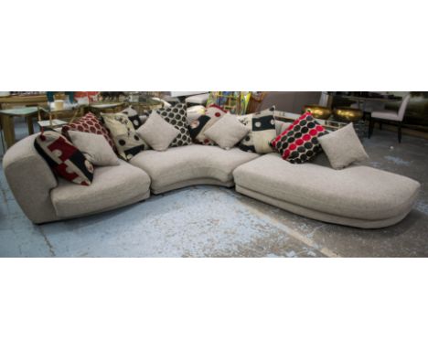 ROCHE BOBOIS CORNER SOFA, taupe fabric in three parts with eleven various scatter cushions, 66cm H x 290cm x 285cm x 111cm D.