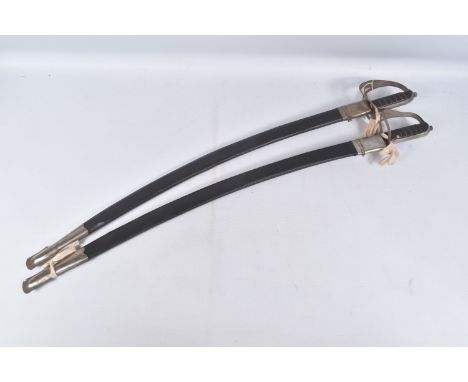 A PAIR OF 20TH CENTURY CURVED SWORDS COMPLETE WITH SCABBARDS, the blades are highly decorated and made in India is also on th