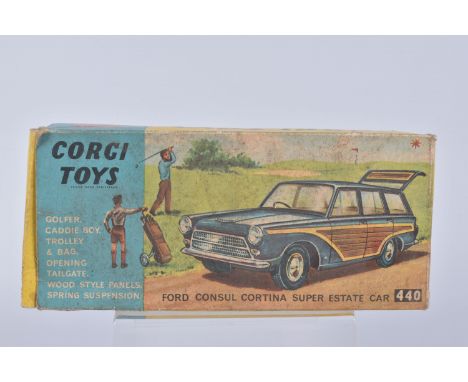 A BOXED DIE CAST CORGI TOYS DIE CAST FORD CONSUL CORTINA SUPER ESTATE CAR, reference 440, dark blue body with brown and cream