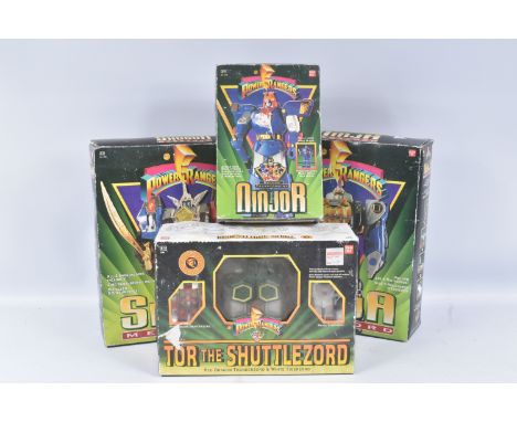 FOUR BOXED 1990'S BANDAI POWER RANGERS MODELS, to include a Deluxe Shogun Megazord, reference 2490, appears complete with ins