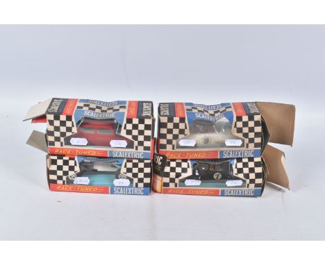 FOUR BOXED SCALEXTRIC RACE-TUNED CARS, Rally Mini Cooper, No.C7, black with white roof RN7, missing part of rear bumper and h