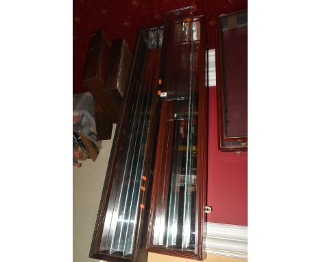 TWO LONG WALL MOUNTED DISPLAY CASES, the first approximately 132cm in length 22.5cm height, 10cm depth, the second approximat
