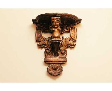 A coopered oak and brass umbrella stand, 58c m high, together with an Italian Baroque giltwood wall bracket, 23cm high and a 