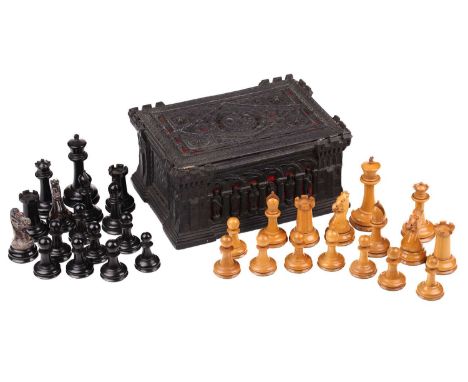 Jacques, London: a 'Staunton Chess Men' boxwood and ebony chess set, mid-19th century, contained in a Gothic Revival carton-p