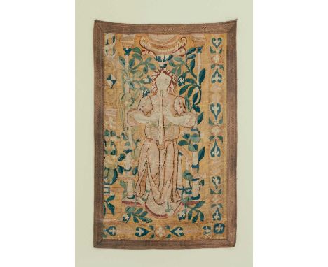 A 17th-century Flemish tapestry fragment panel, depicting an angel amongst floral motifs, 79 cm x 50 cm.Provenance: The conte