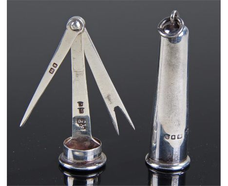 George VI silver travelling tooth pick and fork, London 1938, cased within a tapering case, 6.5cm long when closed, 18.4 gram