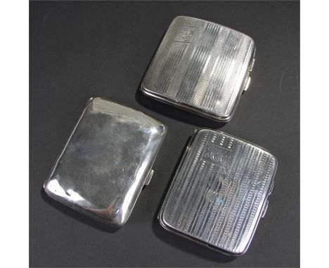 Three silver cigarette cases, 1925 and 1949, two engine turned examples, 250.3 grams, (3)