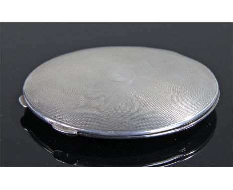 George V silver compact, Birmingham, 1932, engine turned, circular form, mirror to the internal lid, 78mm diameter