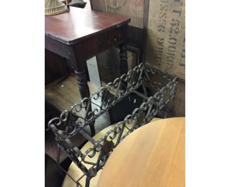 A WROUGHT METAL PLANTER