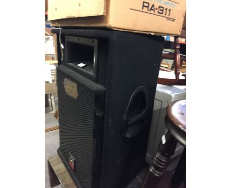A WHARFEDALE SPEAKER AND A ROTEL TUNER